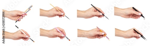 set of different Makeup brush and tweezer with hand  isolated on white background