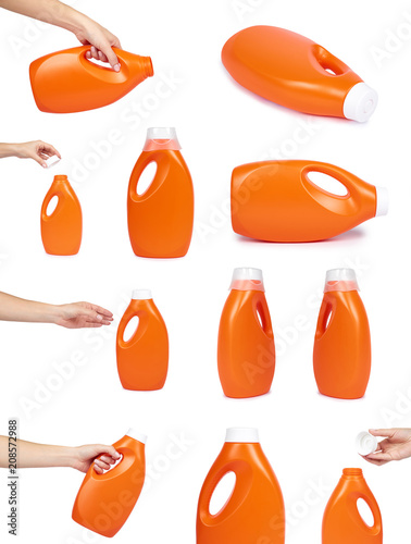 set of different plastic detergent bottle with hand isolated on white background photo