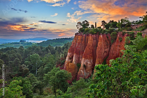 Roussillon, Provence, France: landscape at dawn of the ochre rocks and the valley in the nature park of Luberon