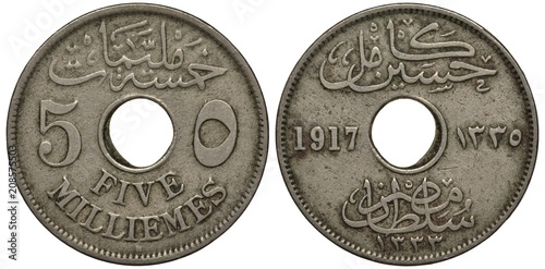 Egypt Egyptian coin 5 five milliemes 1907, center hole divides face value in two languages and dates, photo