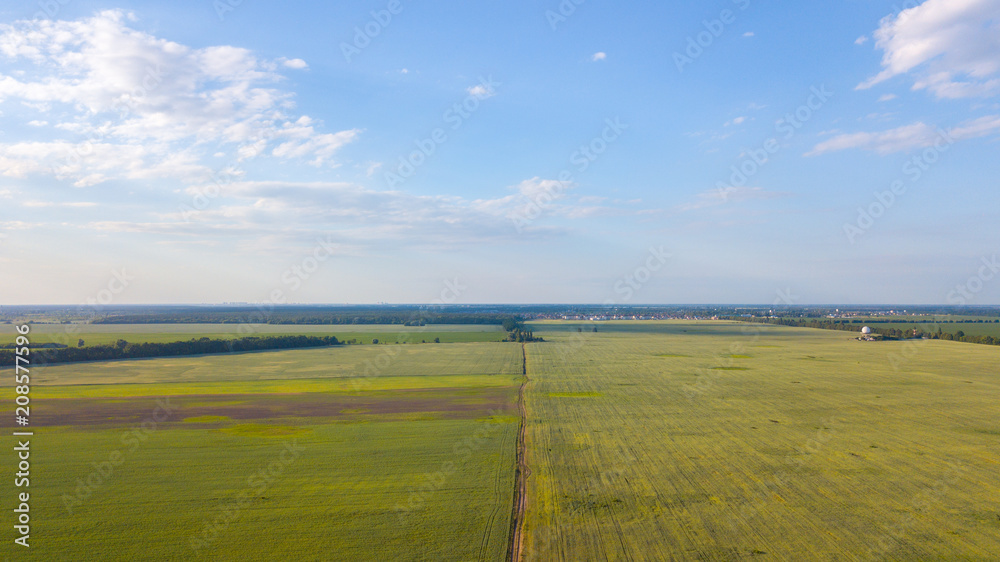 Farmland from above - aerial image of a lush green filed Farmland from above - aerial image of a lush green filed