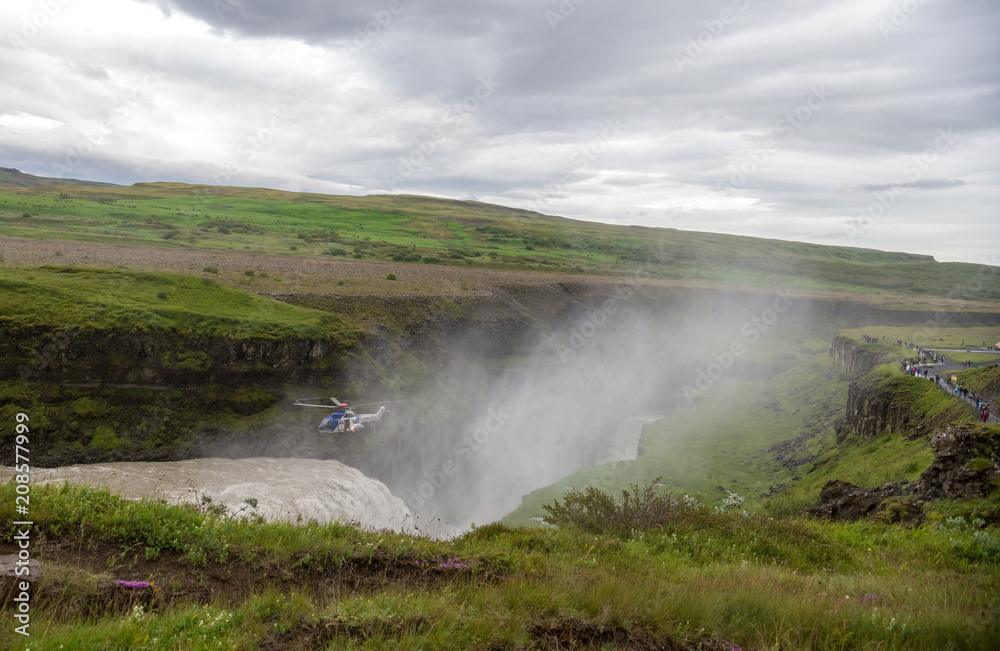 Helicopter over the canyon of Hvita river on a cloudy day. Iceland Helicopter over the canyon of Hvita river on a cloudy day. Iceland
