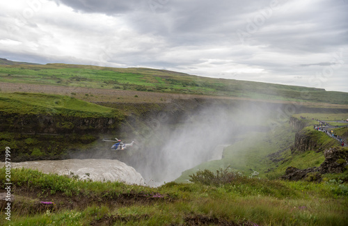 Helicopter over the canyon of Hvita river on a cloudy day. Iceland