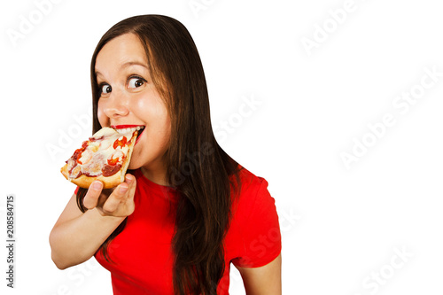 Young beautiful woman eats pizza and smiles  isolated on white background.