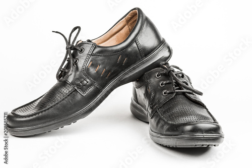 Black leather male shoes, white background photo