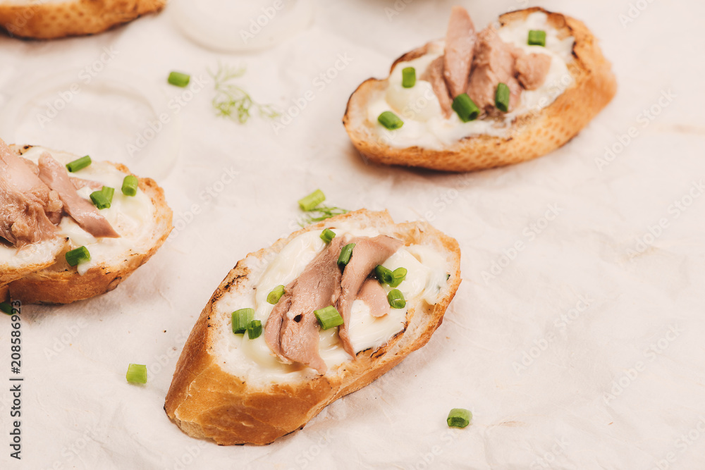 Bruschetta. Sandwich tuna fish salad on wooden background Bruschetta. Sandwich tuna fish salad on wooden background