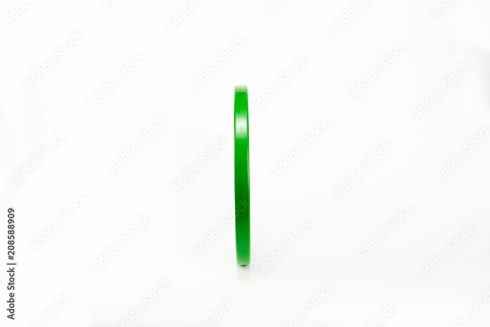 green barbells on white background green barbells on white background