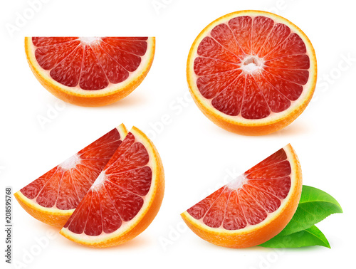 Isolated fruits collection. Pieces of sicilian oranges isolated on white background with clipping path