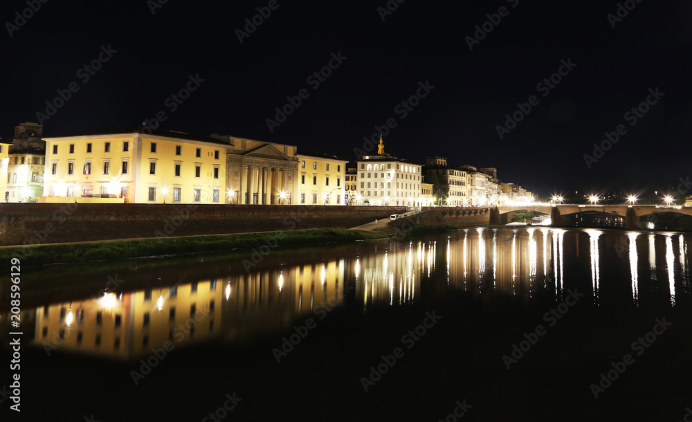 night landscape of the Arno river of Florence or Firenze city Italy
