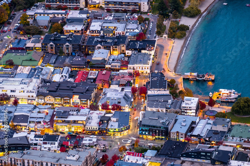 Long exposure photography, close-up, the traffic in Queenstown city during sunset time. © Klanarong Chitmung