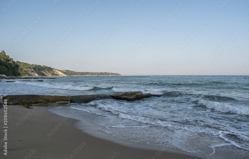 Beautiful view and waves on the beach in Varna, the sea capital of Bulgaria. What's better than sunny weather, sea and sight, waves and a nice company.