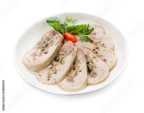Stuffed meat roll on platter, isolated on white