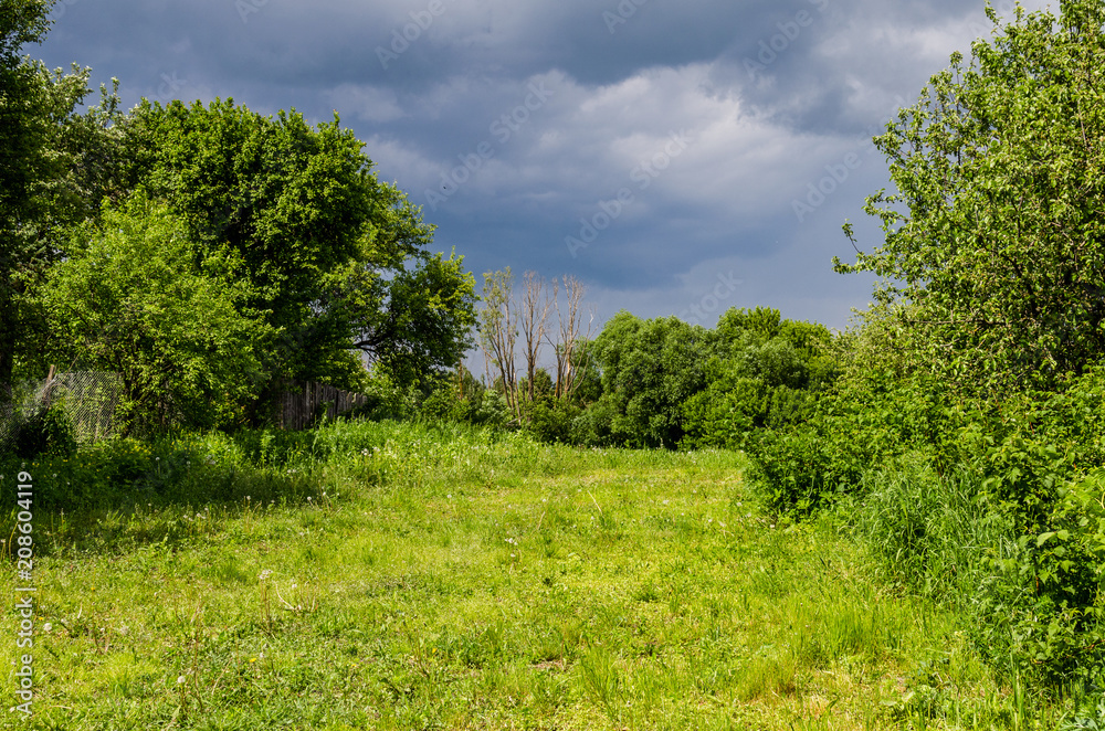 Nature in the countryside. Approaching clouds with rain Nature in the countryside. Approaching clouds with rain