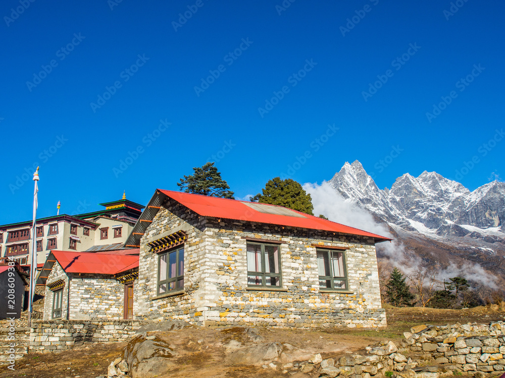 Small Village in Nepal with the beautiful snow capped mountain background Small Village in Nepal with the beautiful snow capped mountain background