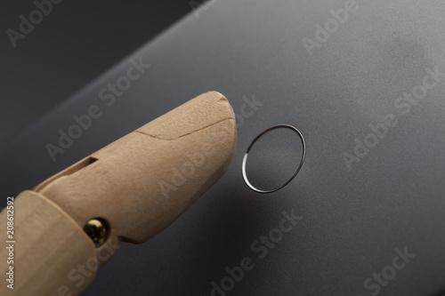 Close-up Robotic finger using fingerprint concept photo