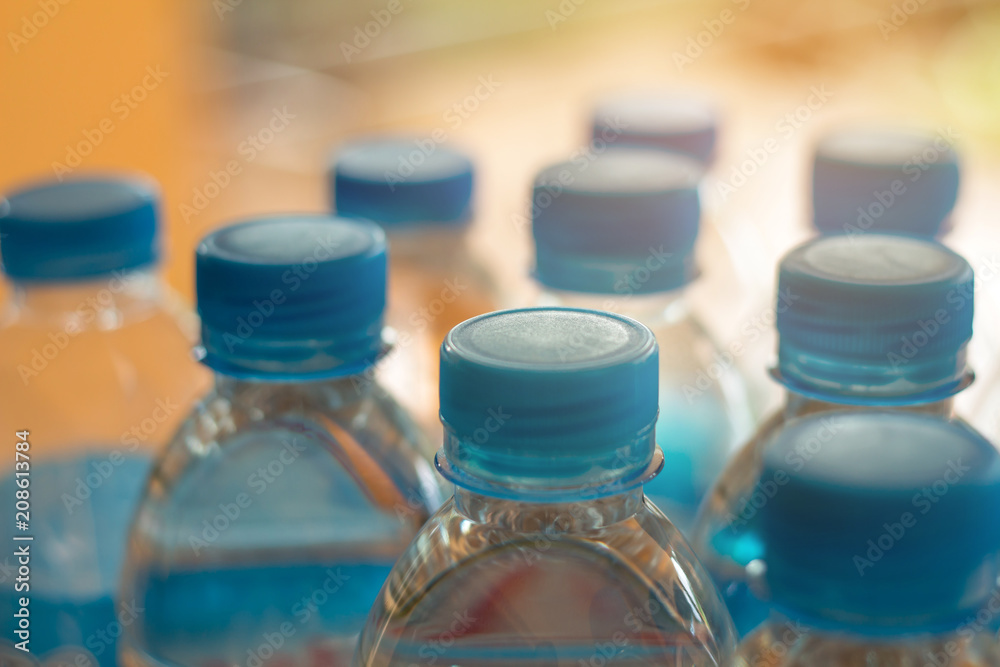 plastic bottle with caps for recycle waste,lot of water bottle waste separation concept selective focus plastic bottle with caps for recycle waste,lot of water bottle waste separation concept selective focus