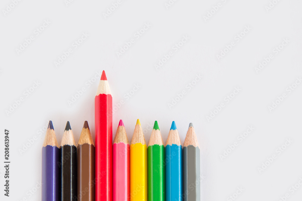 Group of graphite and color pencil, green rubber on white background with space copy Group of graphite and color pencil, green rubber on white background with space copy