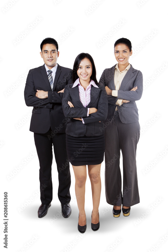 Confident business team standing in the studio Confident business team standing in the studio