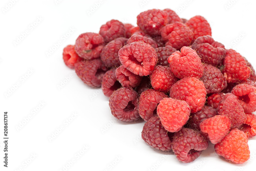 ripe raspberry heap on white with copy space ripe raspberry heap on white with copy space