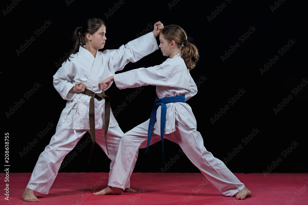 Children are training karate blows Children are training karate blows