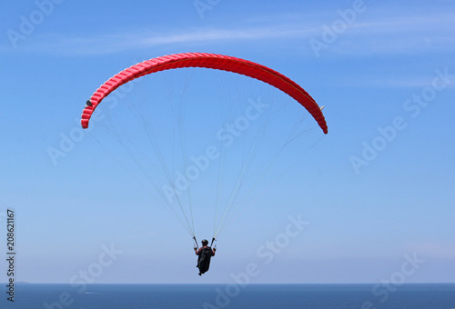 Paraglider above the sea