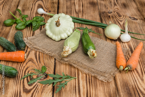 Fototapeta Naklejka Na Ścianę i Meble -  The ripened vegetable marrows, zucchini and bush pumpkins are prepared as ingredients for preparation of healthy food. It can be used as a background