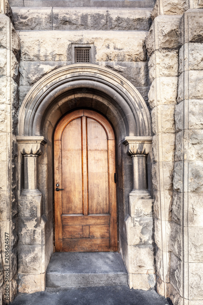 Wooden door on old historic building in melbourne - closeup of architectural detail Wooden door on old historic building in melbourne - closeup of architectural detail
