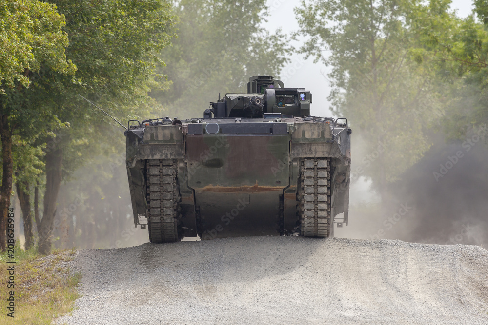 Fototapeta premium German infantry fighting vehicle drives on a street
