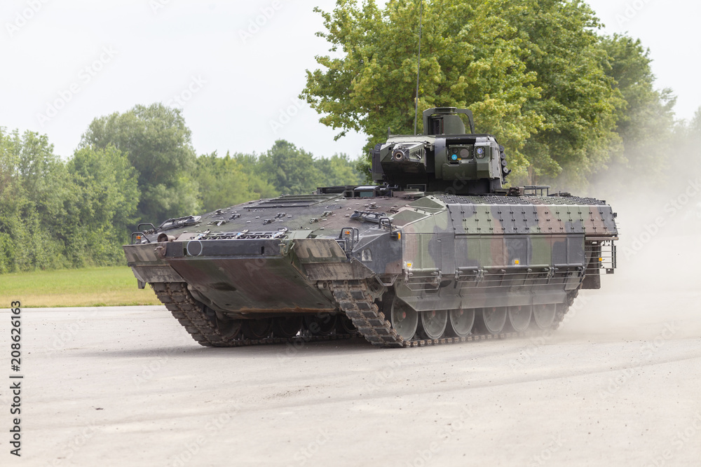 German infantry fighting vehicle drives on a street German infantry fighting vehicle drives on a street