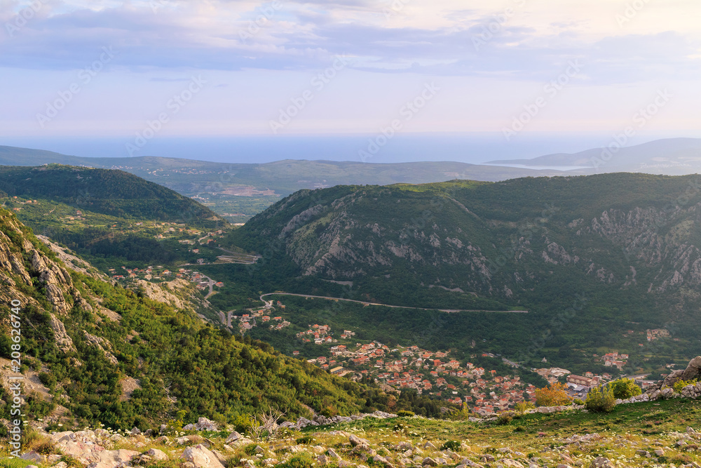 Panoramic view from above on the old city Kotor, Adriatic sea and mountains in Montenegro at sunset time, gorgeous nature landscape Panoramic view from above on the old city Kotor, Adriatic sea and mountains in Montenegro at sunset time, gorgeous nature landscape