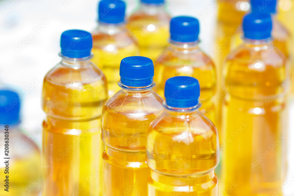 Plastic bottles with yellow sweet liquid drink Plastic bottles with yellow sweet liquid drink