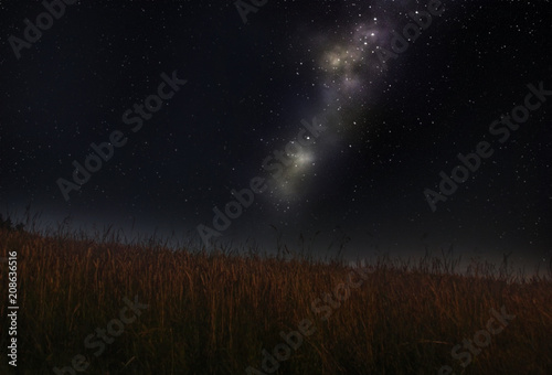 Milky way over field