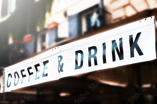 The Coffee and Drink sign above the entrance to the restaurant. 