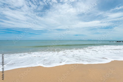 Soft waves on the sand beach