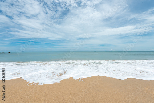 Soft waves on the sand beach © somchaichoosiri