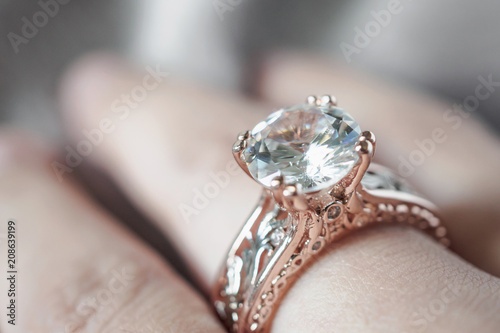 woman hand with jewelry diamond ring on finger