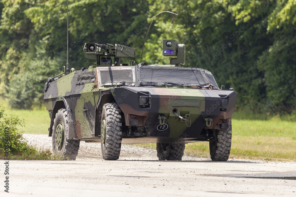 German light armoured  reconnaissance vehicle drives on a road