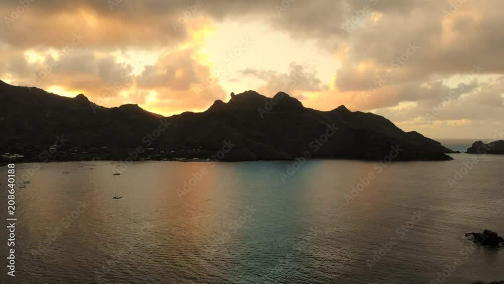 Aerial panoramic view of Taiohae bay on Nuku Hiva island at sunrise, town of Taiohae - South Pacific Ocean, Marquesas Islands, landscape of French Polynesia from above, 4k Aerial panoramic view of Taiohae bay on Nuku Hiva island at sunrise, town of Taiohae - South Pacific Ocean, Marquesas Islands, landscape of French Polynesia from above, 4k