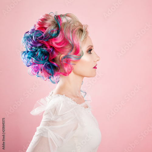 Cool young woman with colored hair. Stylish hairstyle, informal style.