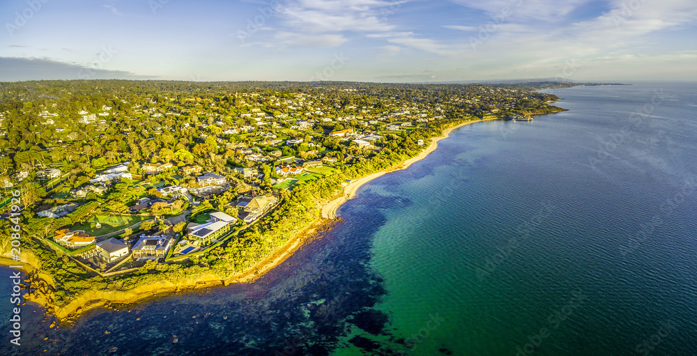 Bird's eye view panorama of Mornington Peninsula coastline and luxury villas in Melbourne, Australia