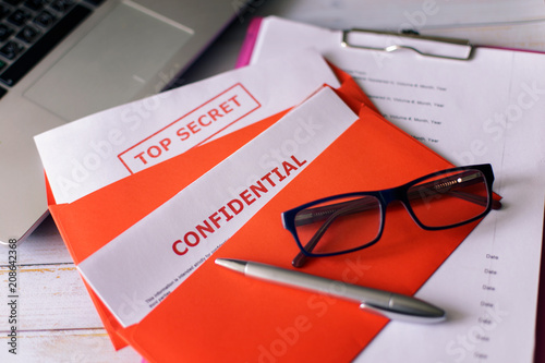 Red letters with a stamp are confidential