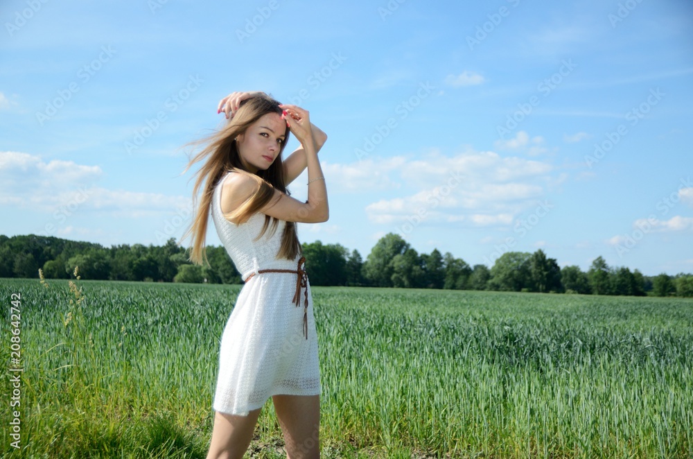 Petite woman and nature