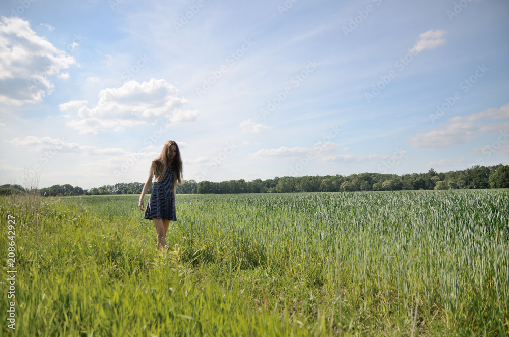 Petite woman and nature