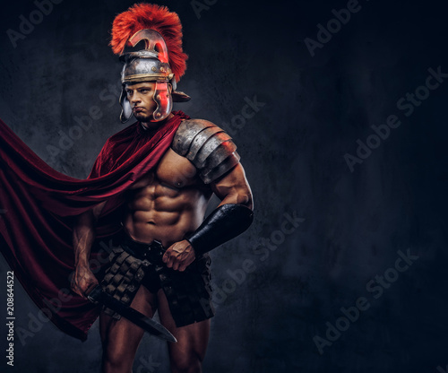 Portrait of a brutal Roman legionary in battle uniforms