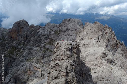 Lonely tourist at the top of mountain