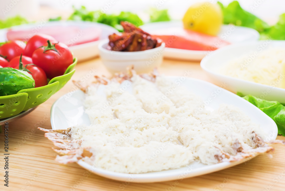 seafood. Raw shrimp in breading. Greek cuisine. Making tasty and healthy food at home seafood. Raw shrimp in breading. Greek cuisine. Making tasty and healthy food at home