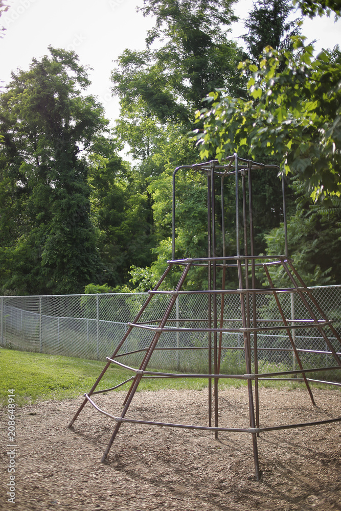 Fototapeta premium Empty Elementary Schoolyard Jungle Gym Monkey Bars