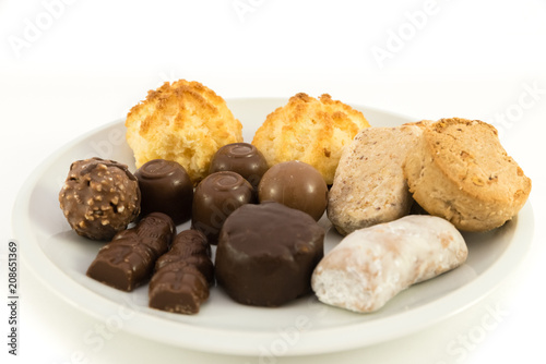 Polvorones typical spansih and chocolate sweets on white background