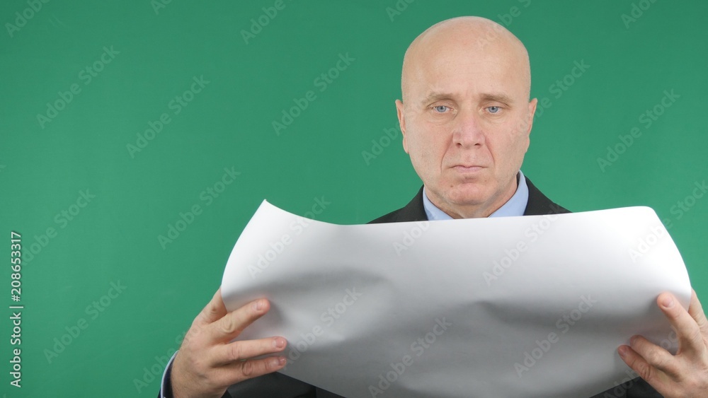 Businessman Image Working With Plans and Green Screen in Background Businessman Image Working With Plans and Green Screen in Background