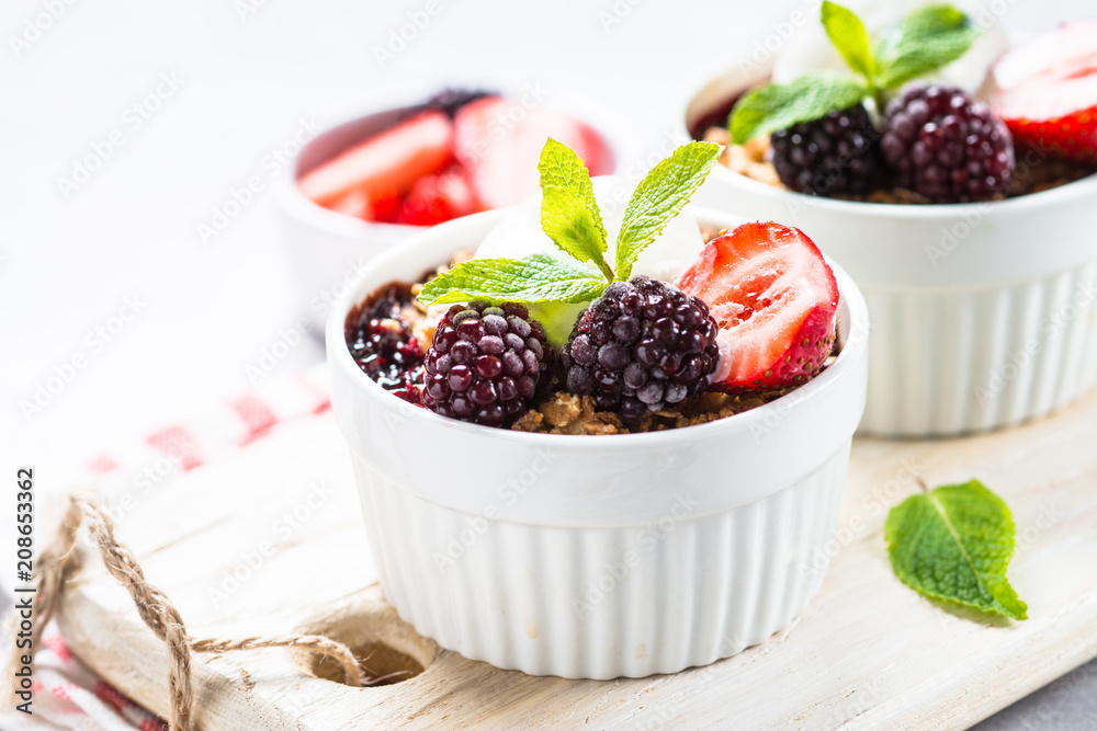 Crumble pie with berry mix, granola and ice cream. Crumble pie with berry mix, granola and ice cream.